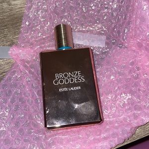 Bronze goddess perfume. More than half full